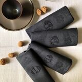 Set of four old damasked towels tinted black