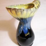 Vase with twisted handle