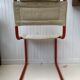 Orange tube chair