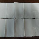 Set of eight embroidered linen napkins 39 X 41 cm