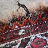Ancien tapis en laine fait main