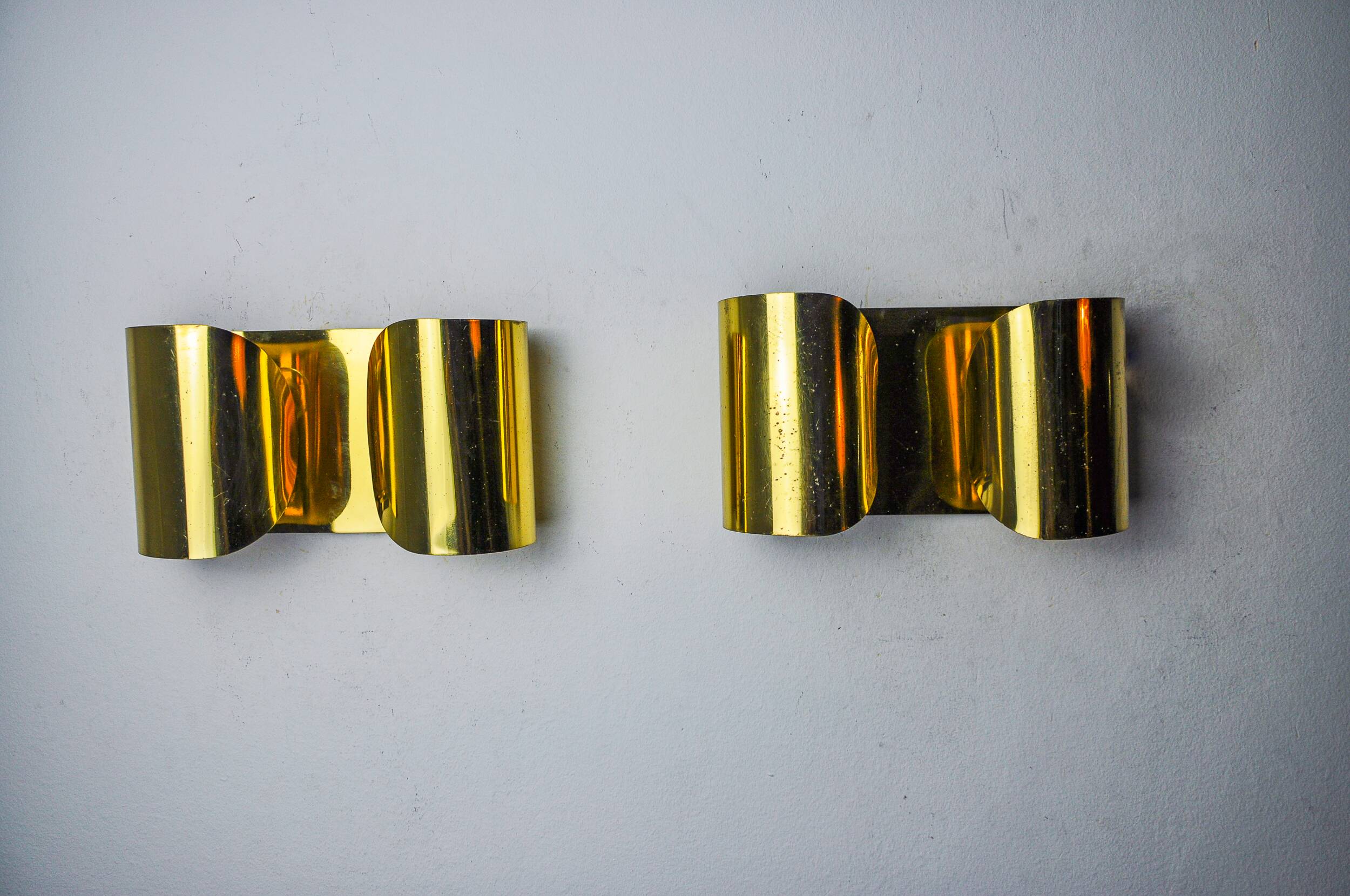 Pair of "Foglios" brass wall lights, Italy, 1970