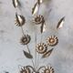 Applique murale fleurs metal doré
