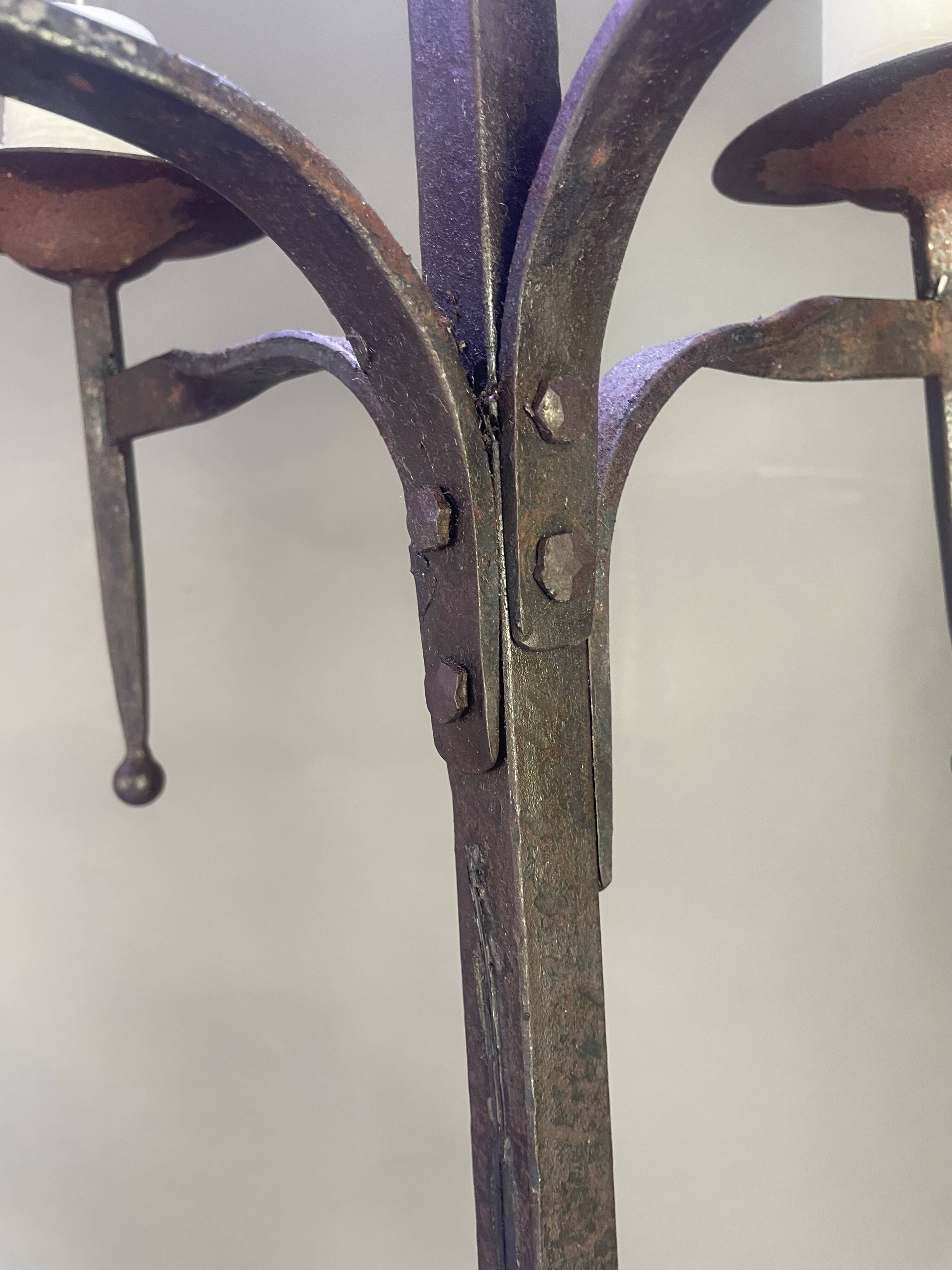 Pair of wrought iron candelabras
