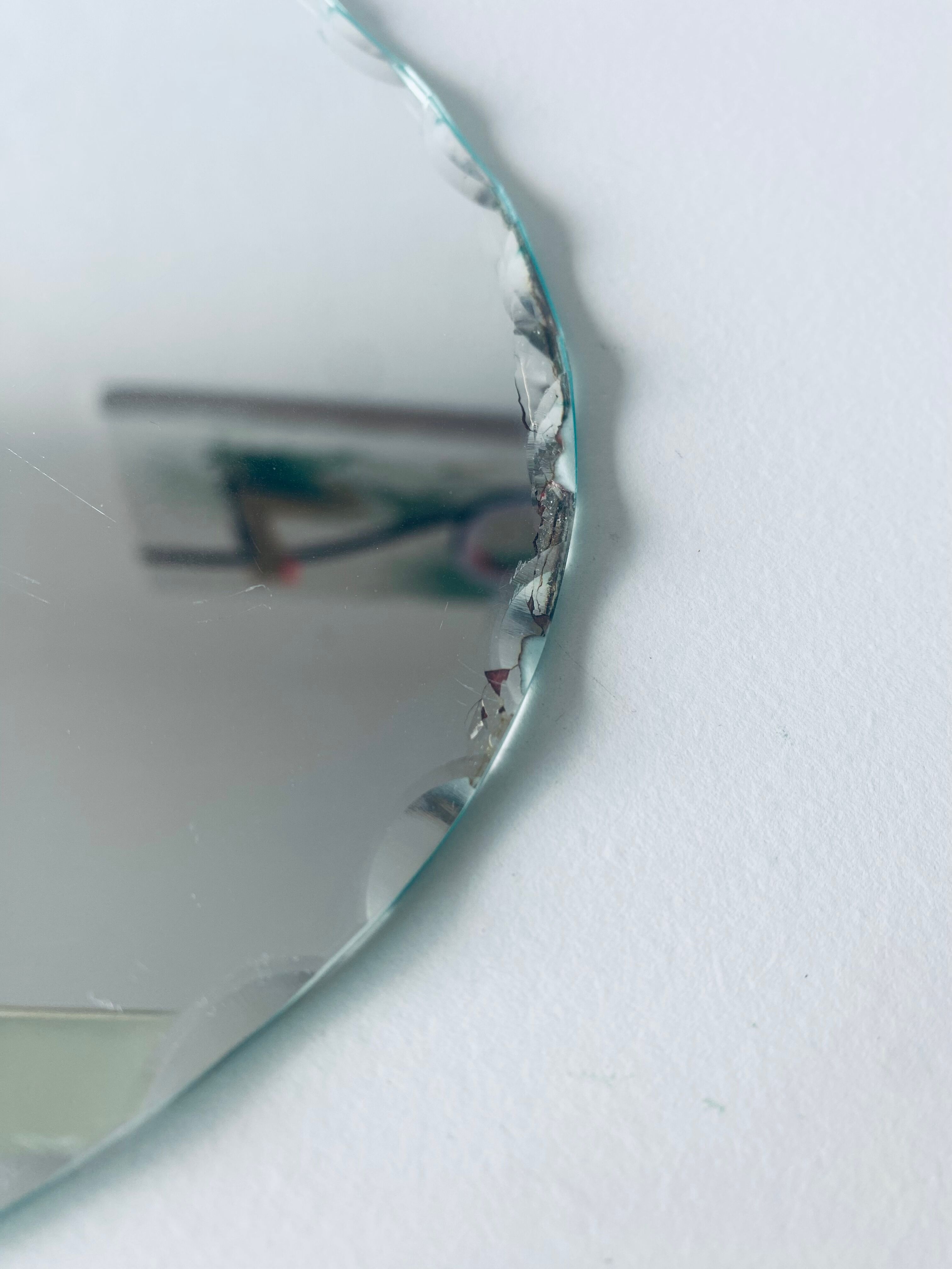 Oval beveled mirror 50x25cm