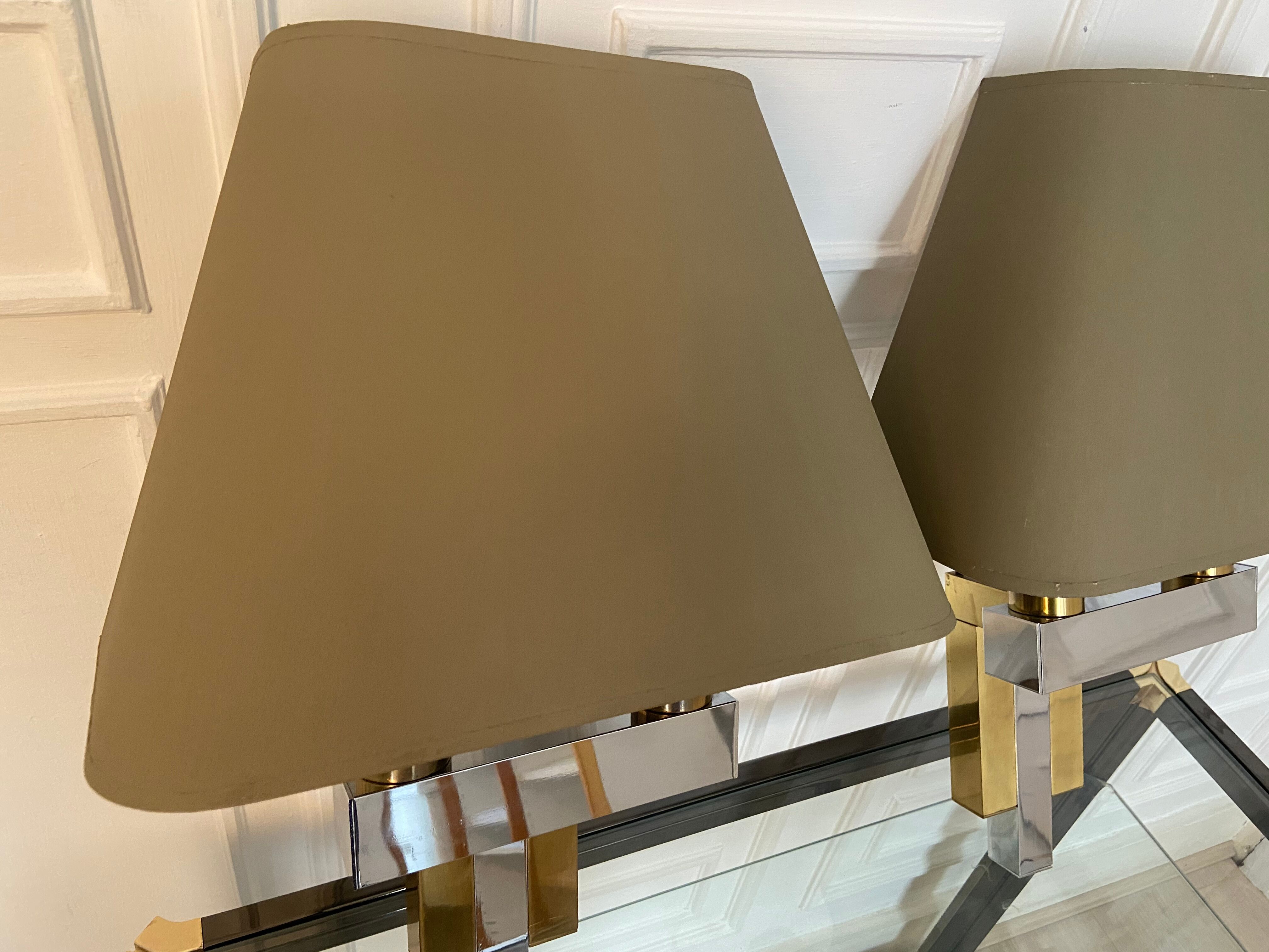 Pair of chrome and brass sconces, Italy, 1970s