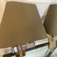 Pair of chrome and brass sconces, Italy, 1970s