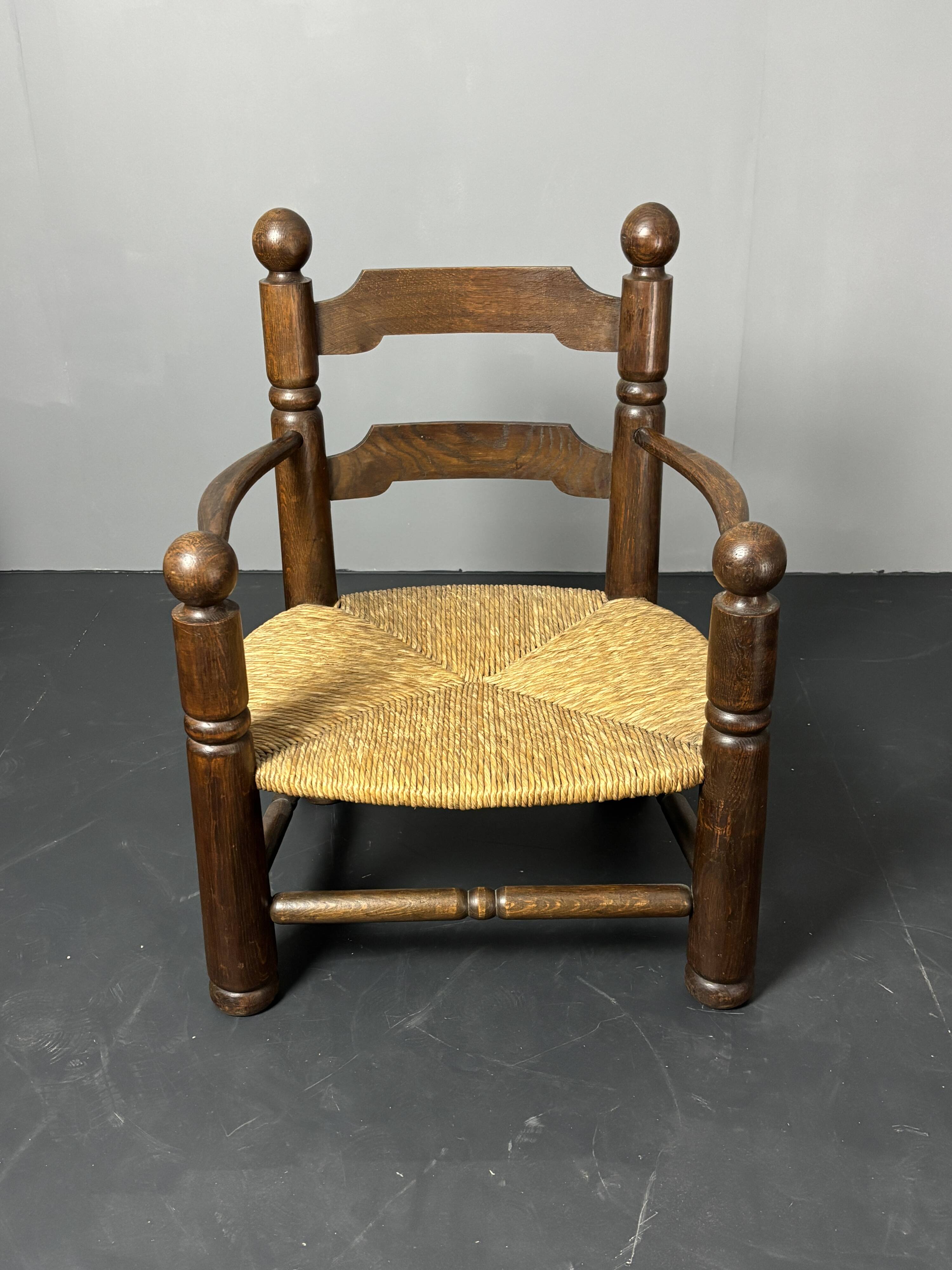 Brutalist French low rush oak side armchair by Charles Dudouyt ca 1940s