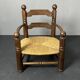 Brutalist French low rush oak side armchair by Charles Dudouyt ca 1940s