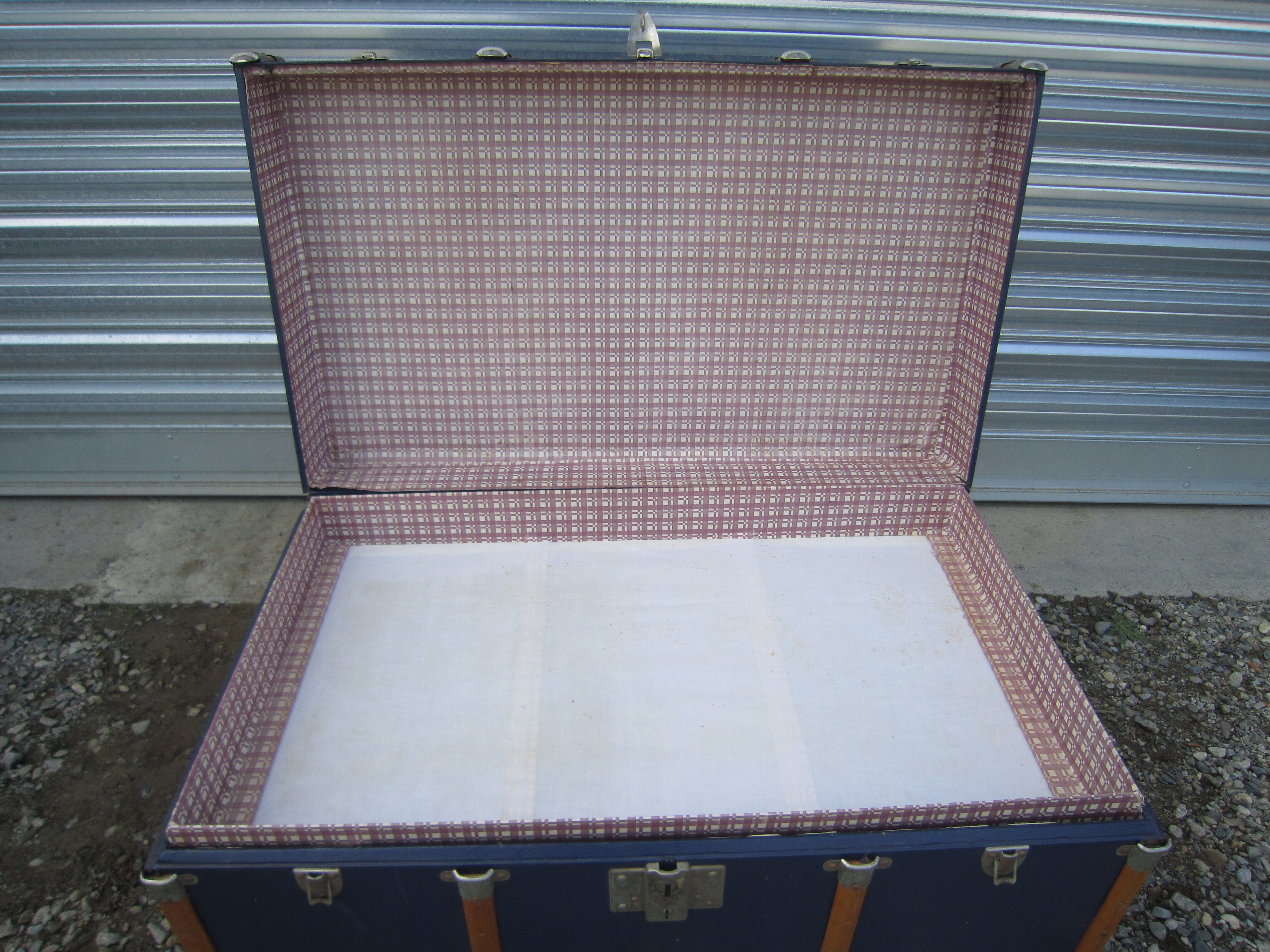 Old blue travel trunk handle leather