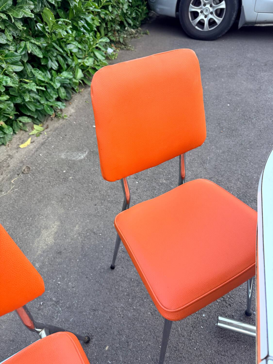 Formica leatherette chair with orange table, vintage 70s Space Age