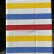 Folding chair in wood and striped fabric