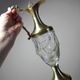Vintage decorative jug in moulded glass and gilded brass, Italy circa 1980.