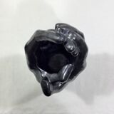 Vase with intertwined hands