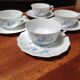 Set of 4 Limoges porcelain cups and saucers.