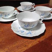 Set of 4 Limoges porcelain cups and saucers.