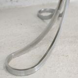 Living room table "Space Age" polished steel, circular slab smoked glass. France, circa 1970.