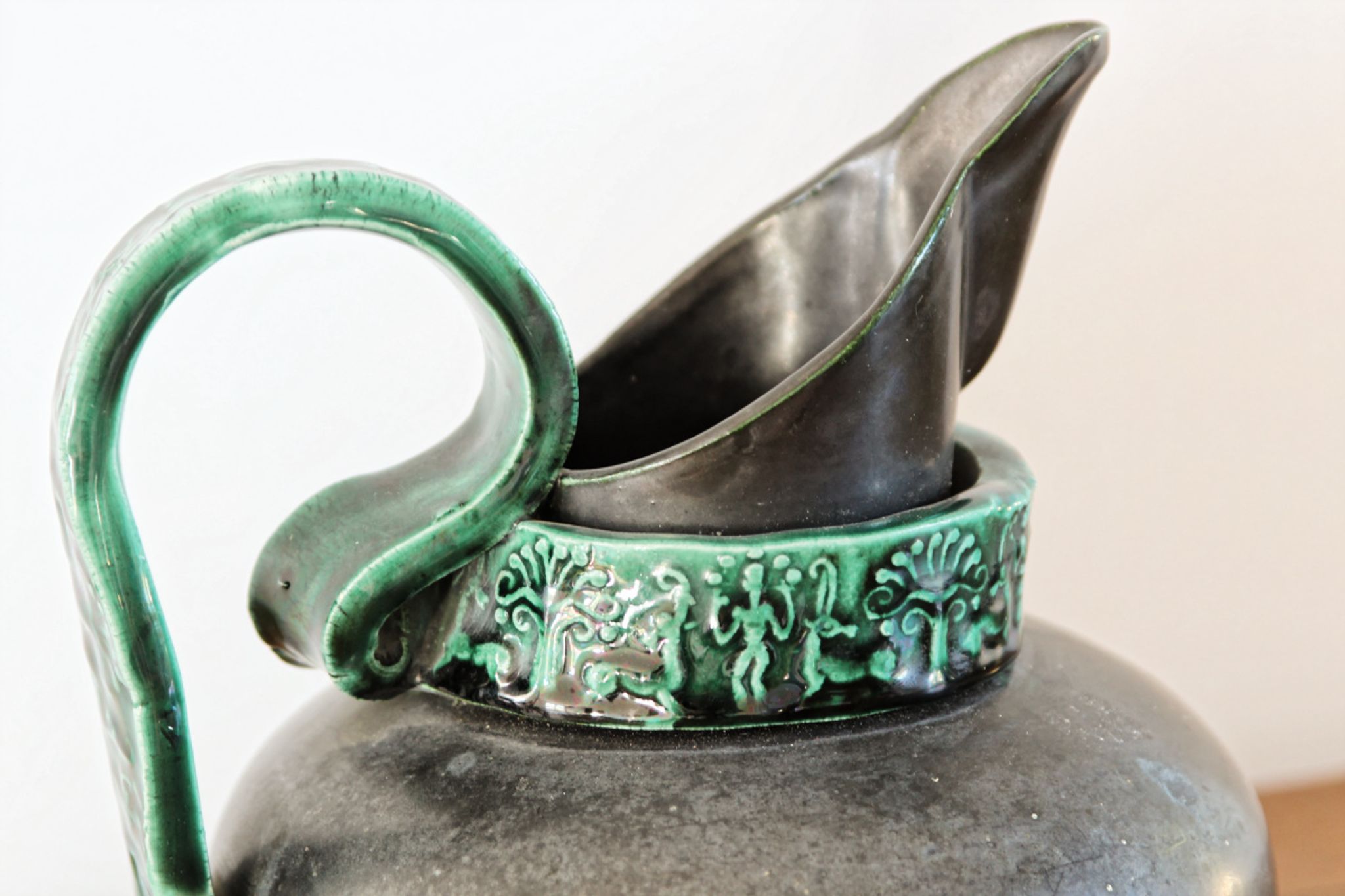 Pitcher in earthenware, metallic black