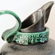 Pitcher in earthenware, metallic black