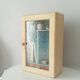 Glass medicine cabinet 50s