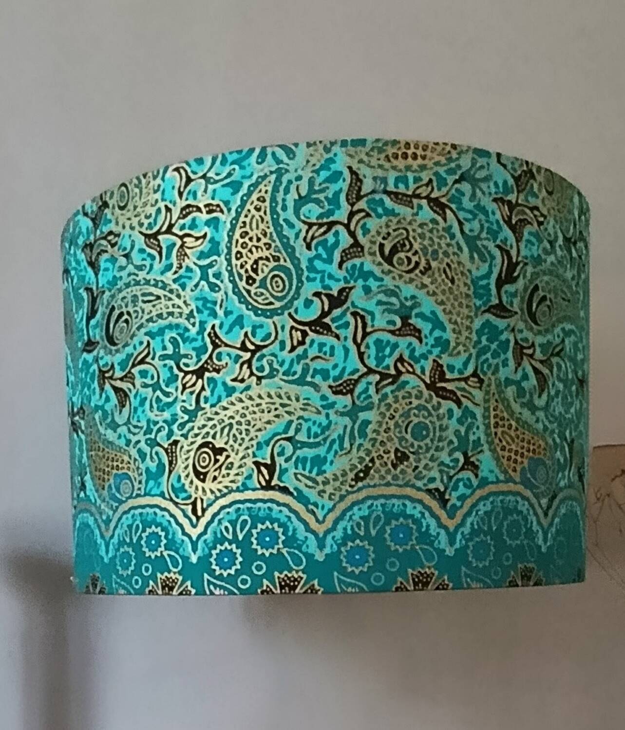 vintage fabric lampshade with golden paisley pattern