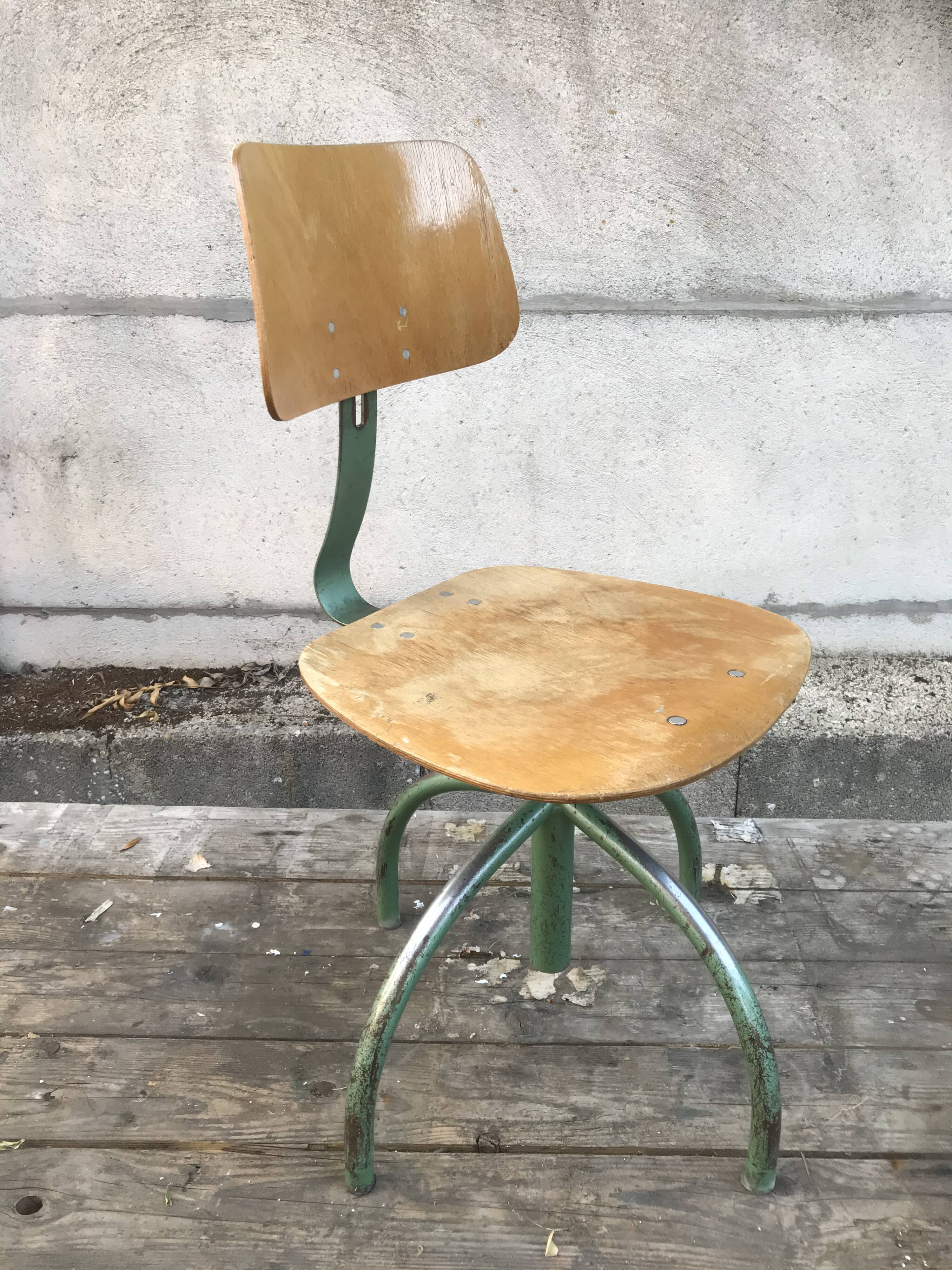 Former green metal workshop chair