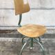 Former green metal workshop chair