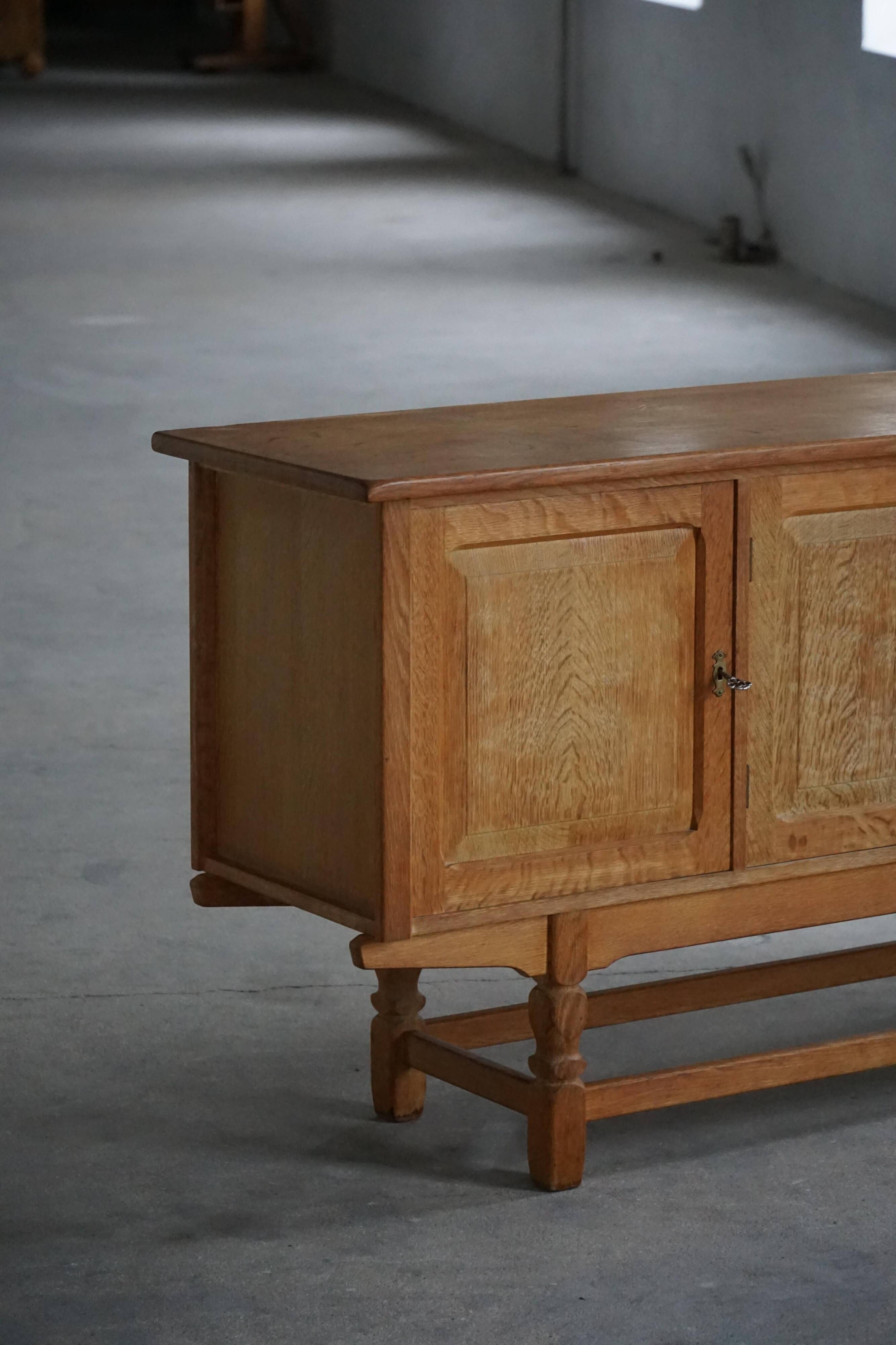 Low oak sideboard, mid-century modern, made by a Danish cabinetmaker, 1960s.