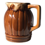 Small brown ceramic pitcher