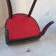 Pair of mahogany gondola chairs – Empire style – 20th century, restored