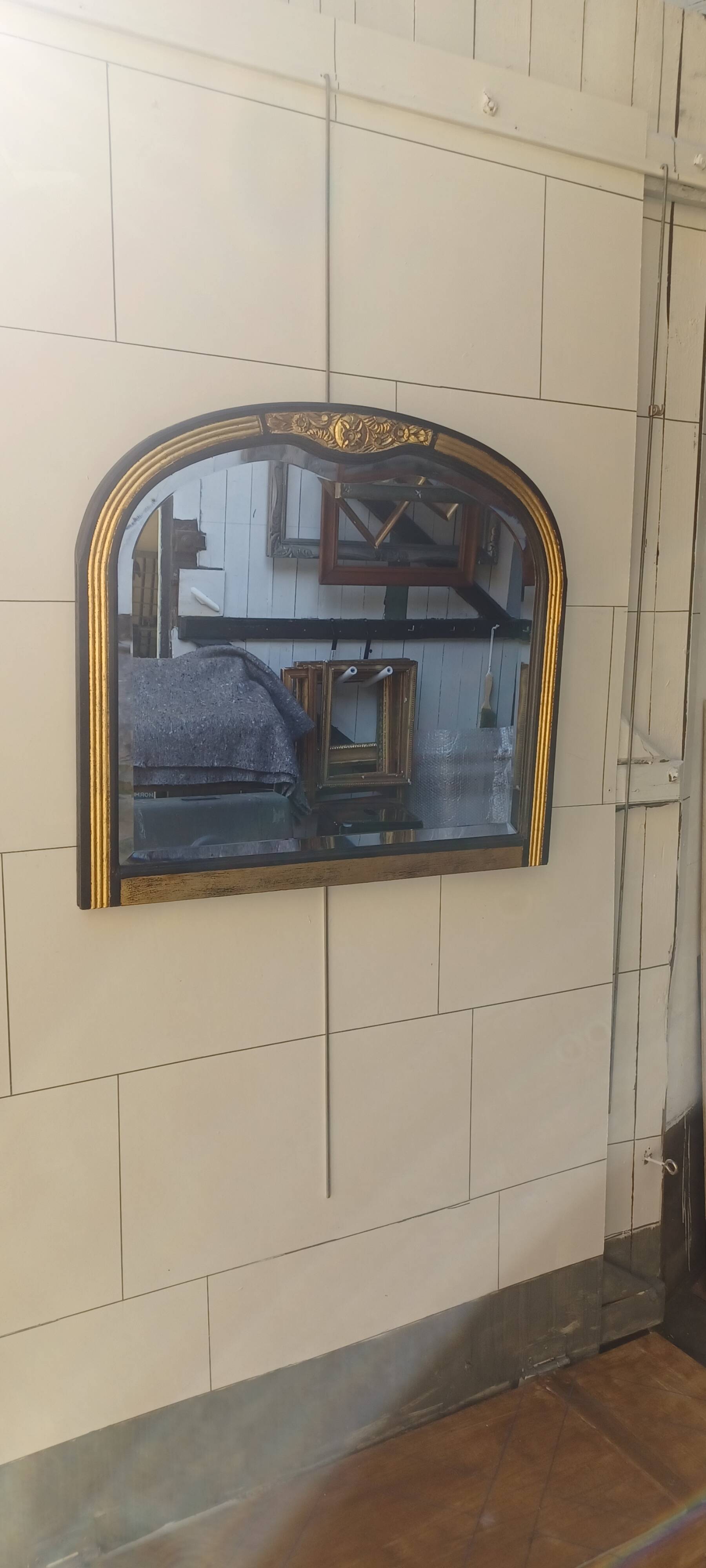 ART DECO BLACK AND GOLD MIRROR (1925-1945)