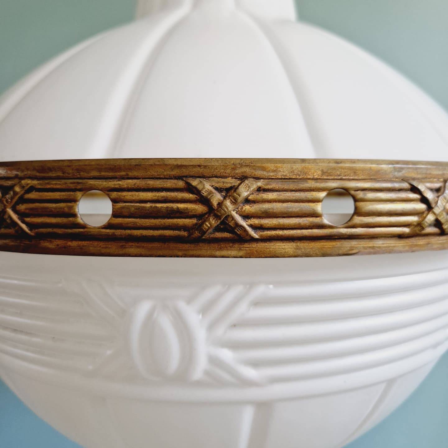 Large Art Deco pendant light in milk glass and brass, 1920s