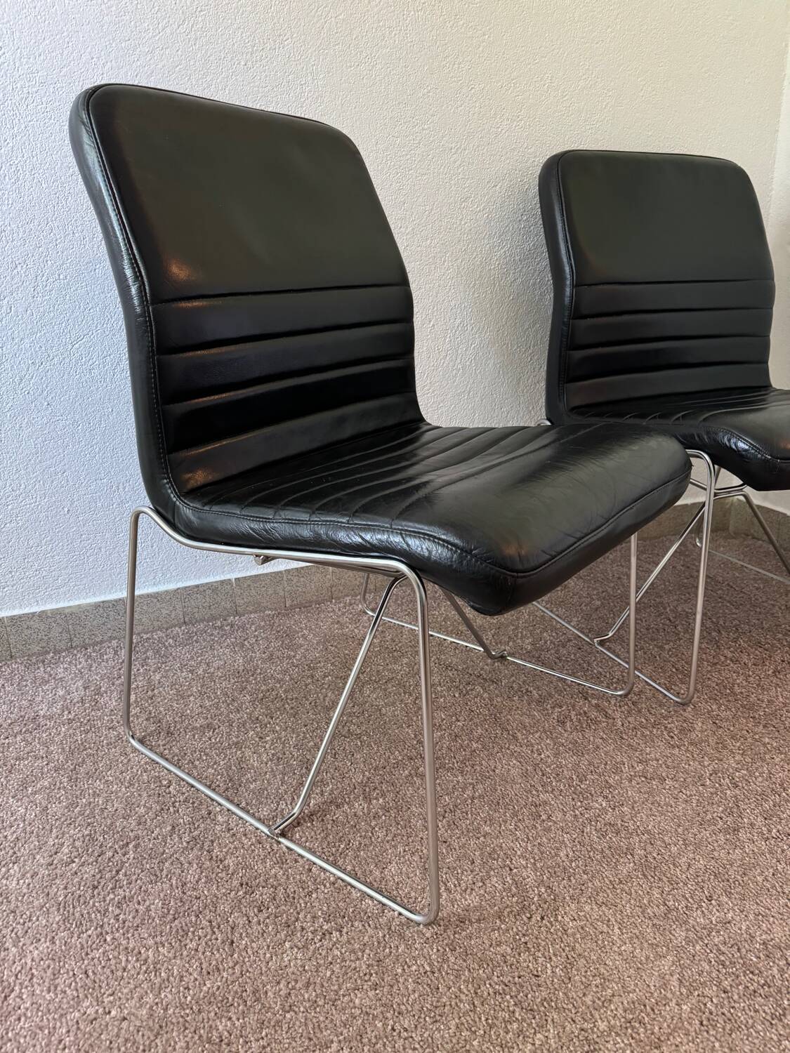 Black leather armchairs, Italian design, 70s (X2)