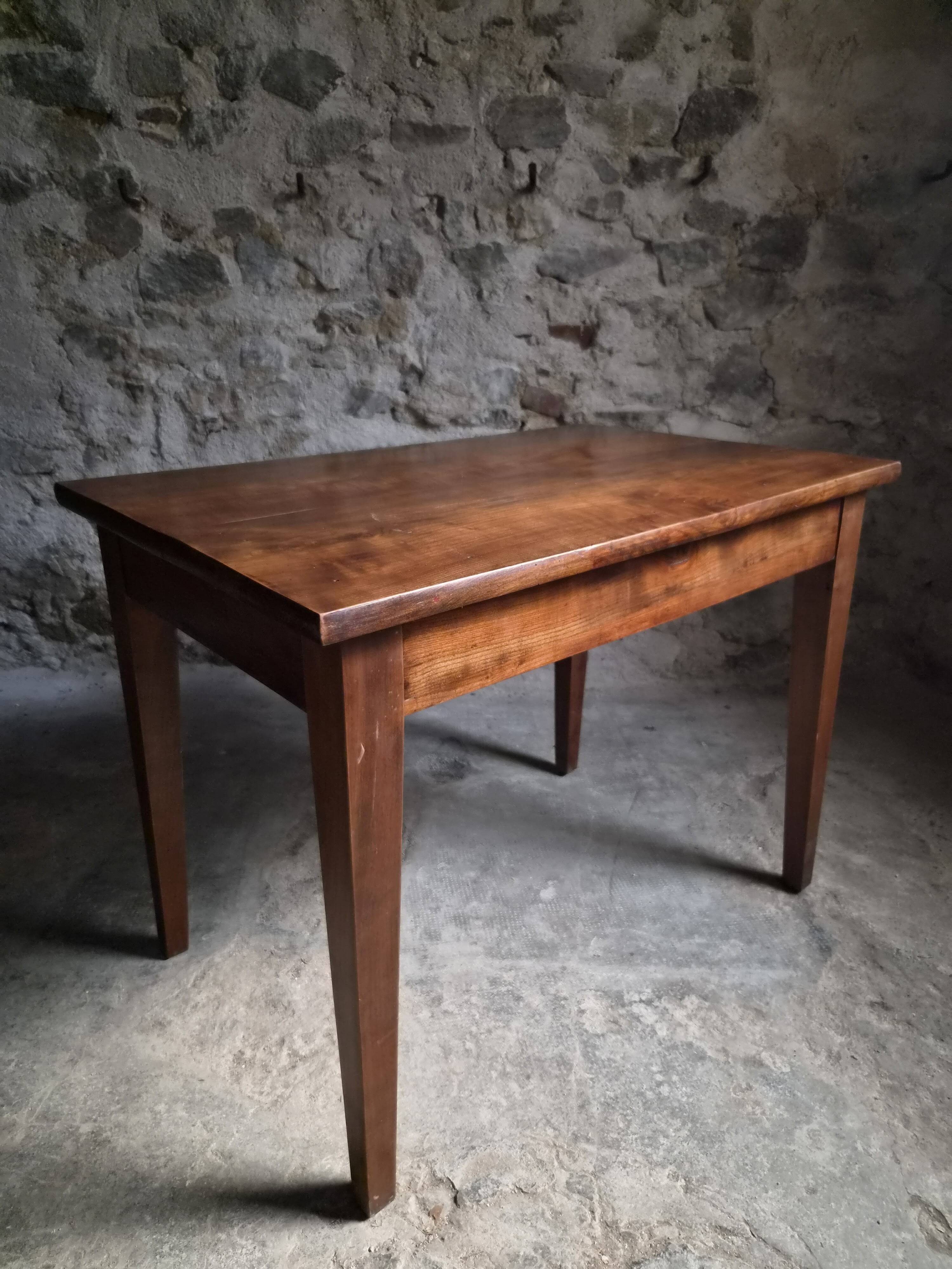 Old French table in cherry wood with bistro chair, circa 1900–1930.