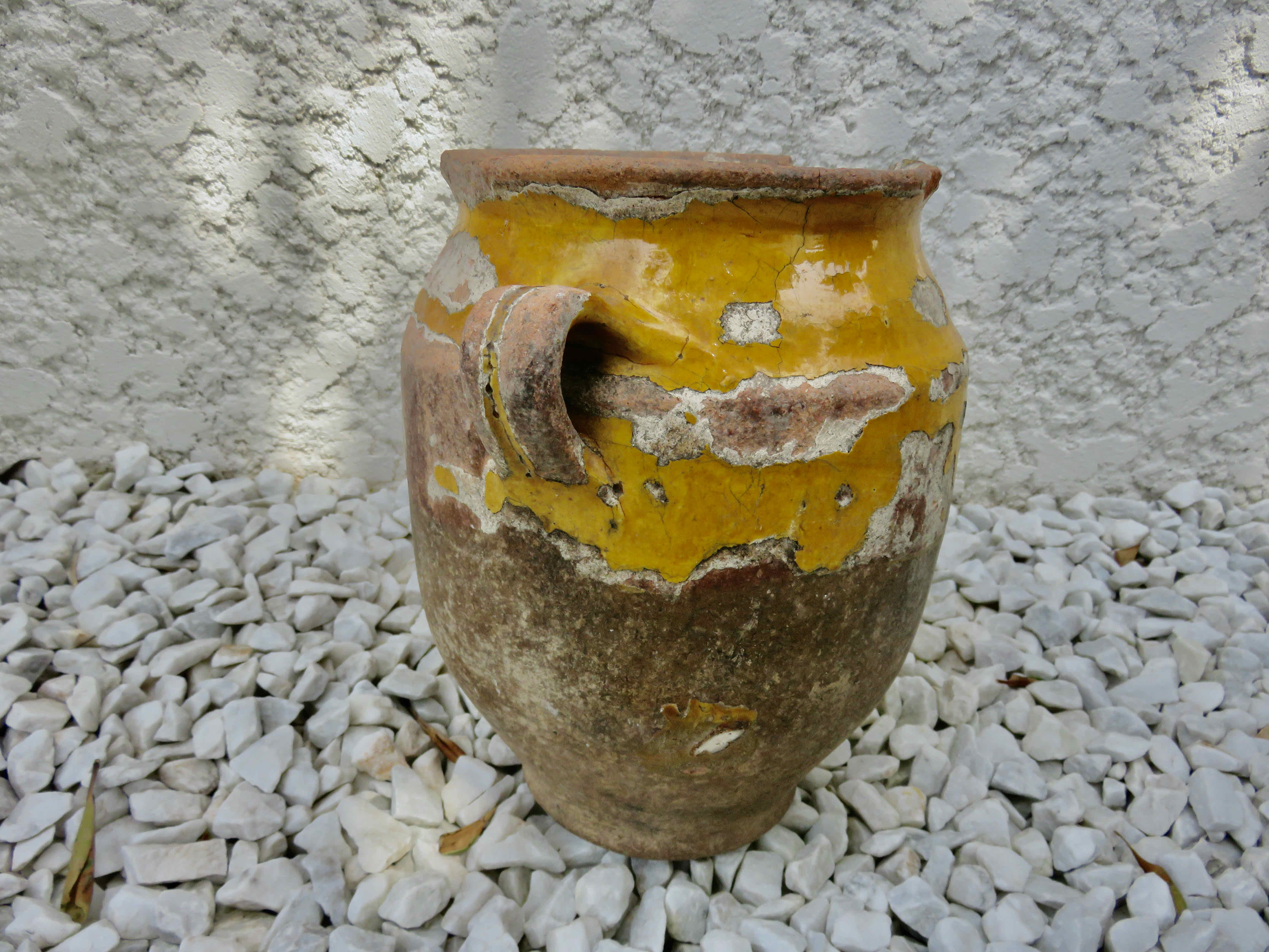 Old candied pot in yellow glazed terracotta XIX century