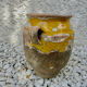 Old candied pot in yellow glazed terracotta XIX century