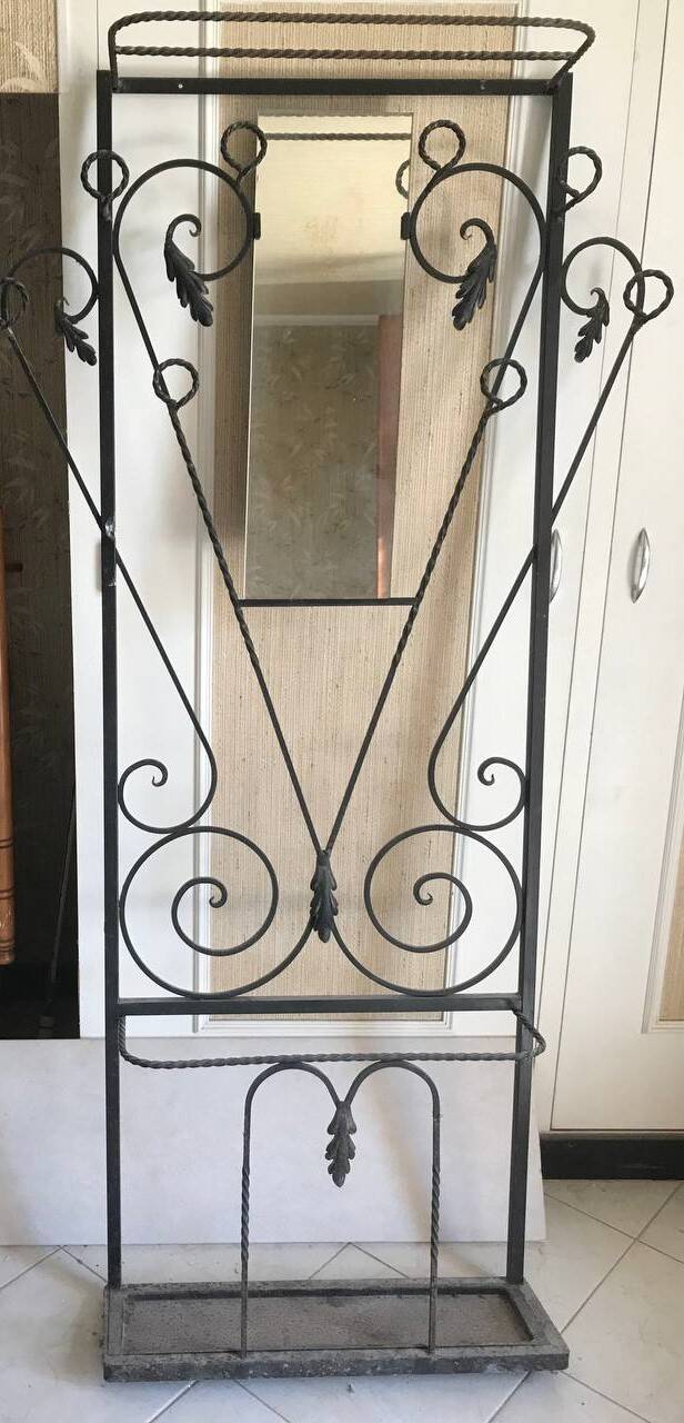 Wrought iron coat rack and shelf
