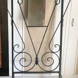 Wrought iron coat rack and shelf