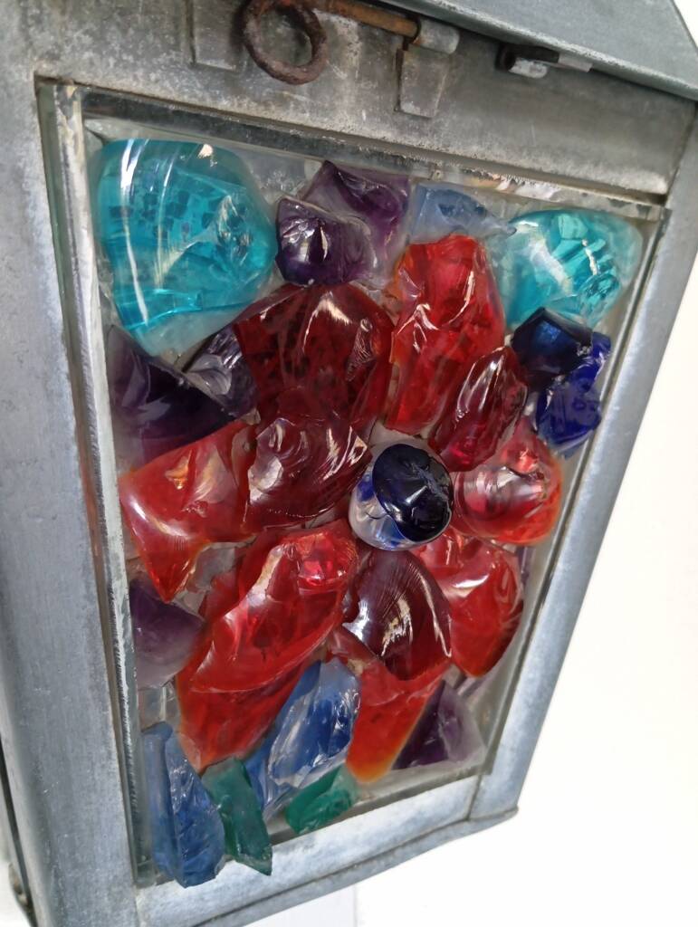 Zinc and colored glass wall light