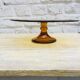 Yellow moulded glass standing cake dish