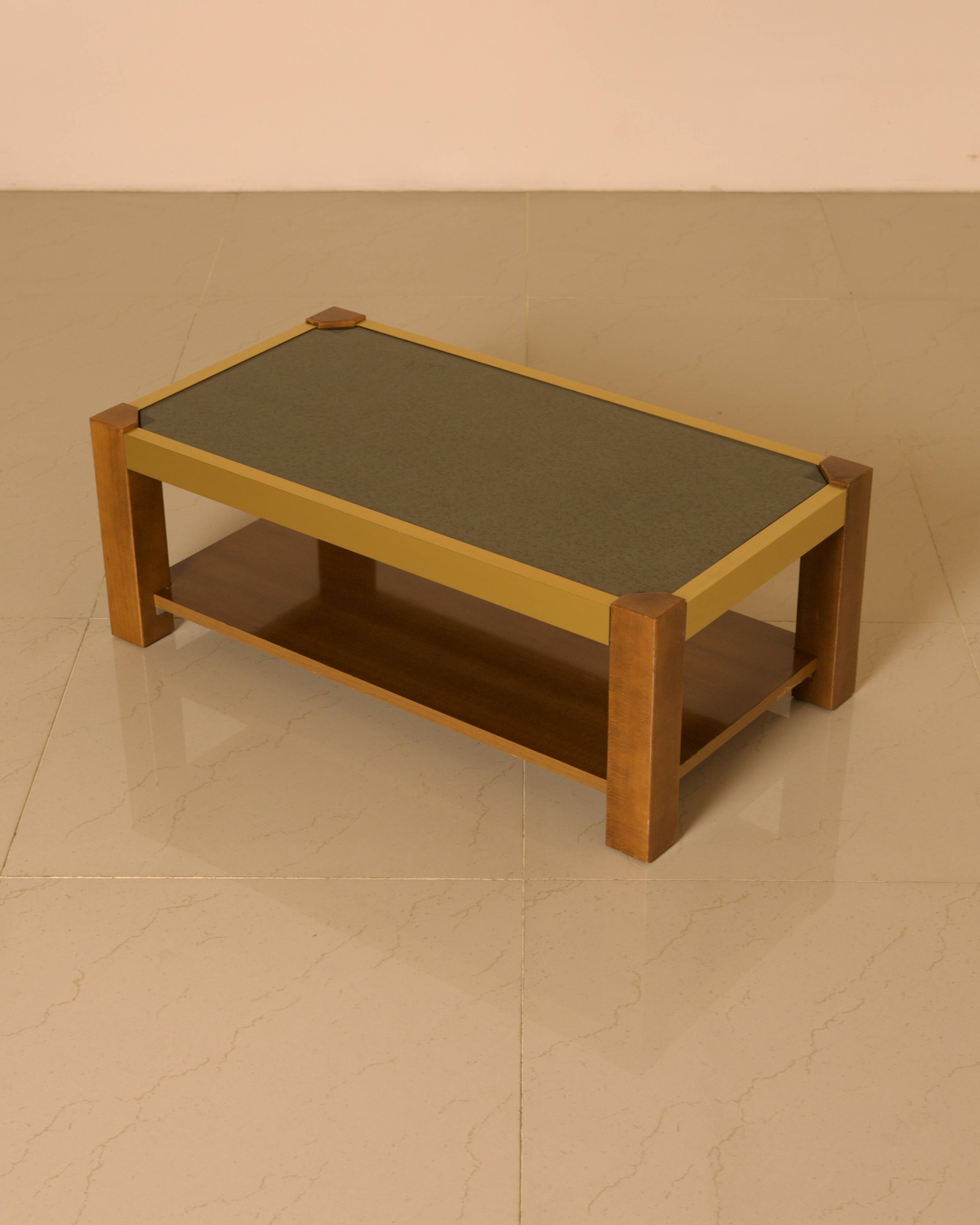 Rectangular Italian coffee table in wood and gold metal from the 70s.