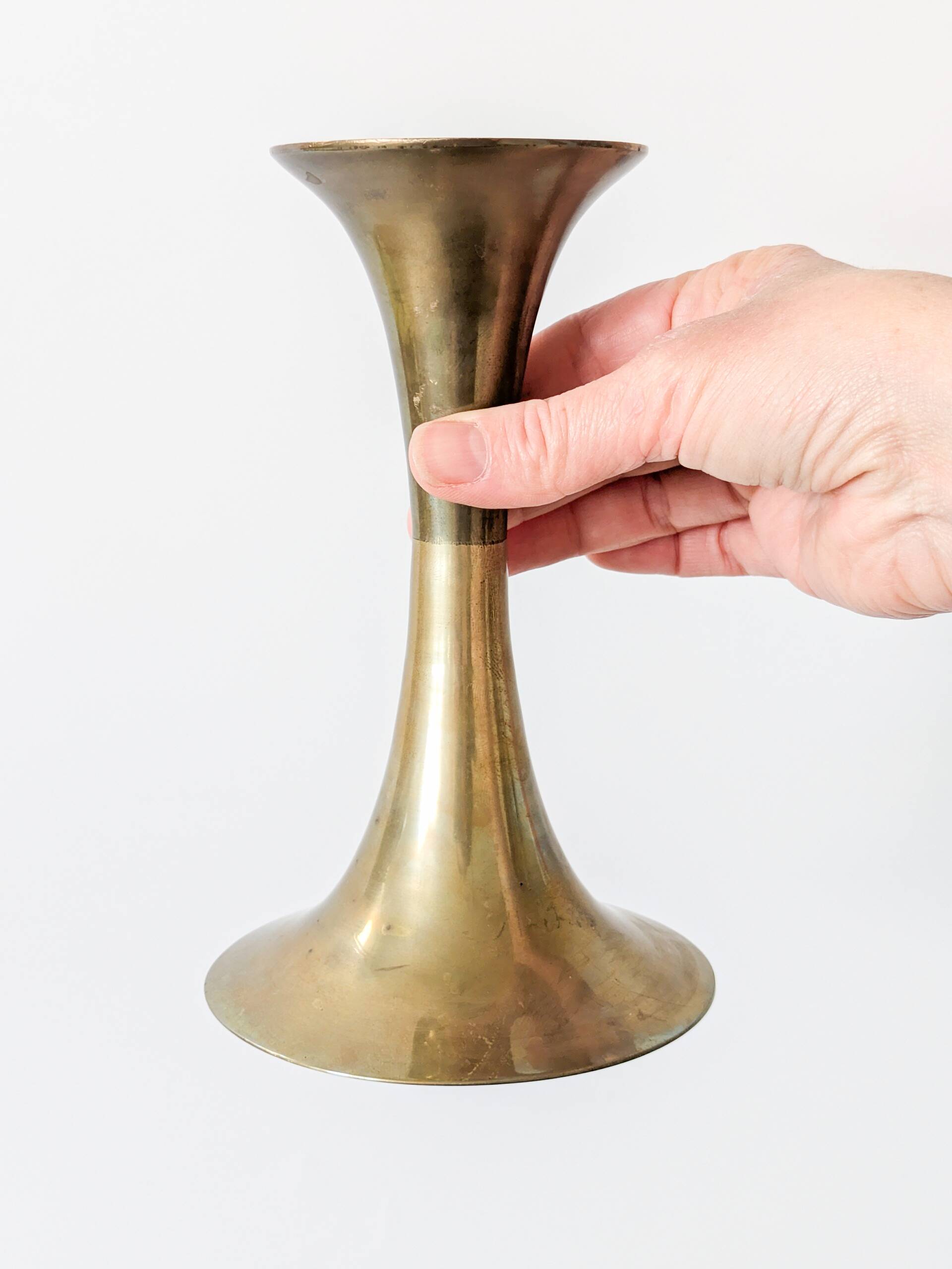Pair of Midcentury brass candlesticks, flared shape.