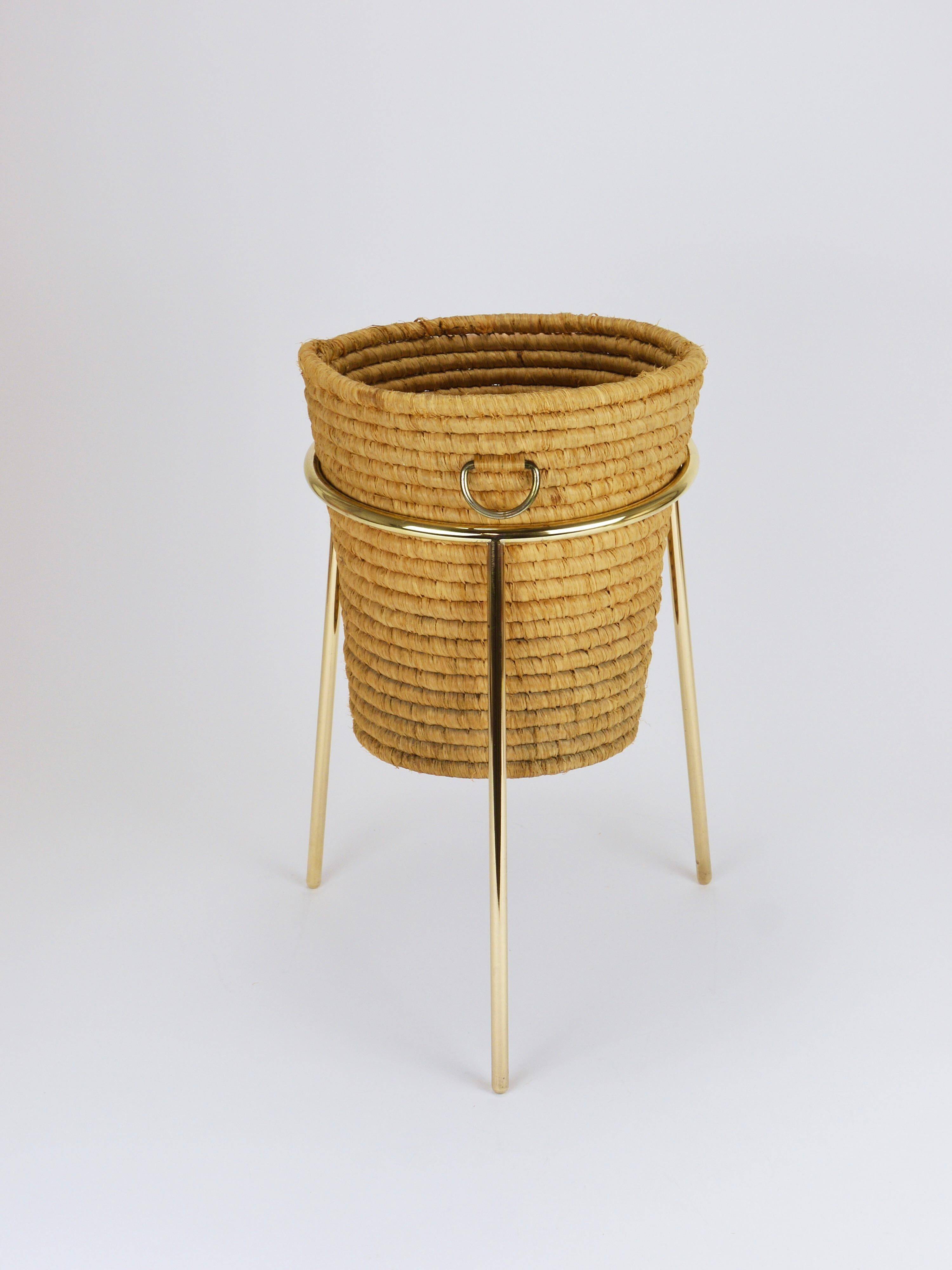 Carl Auböck II paper basket in raffia and brass, umbrella stand, 1950s