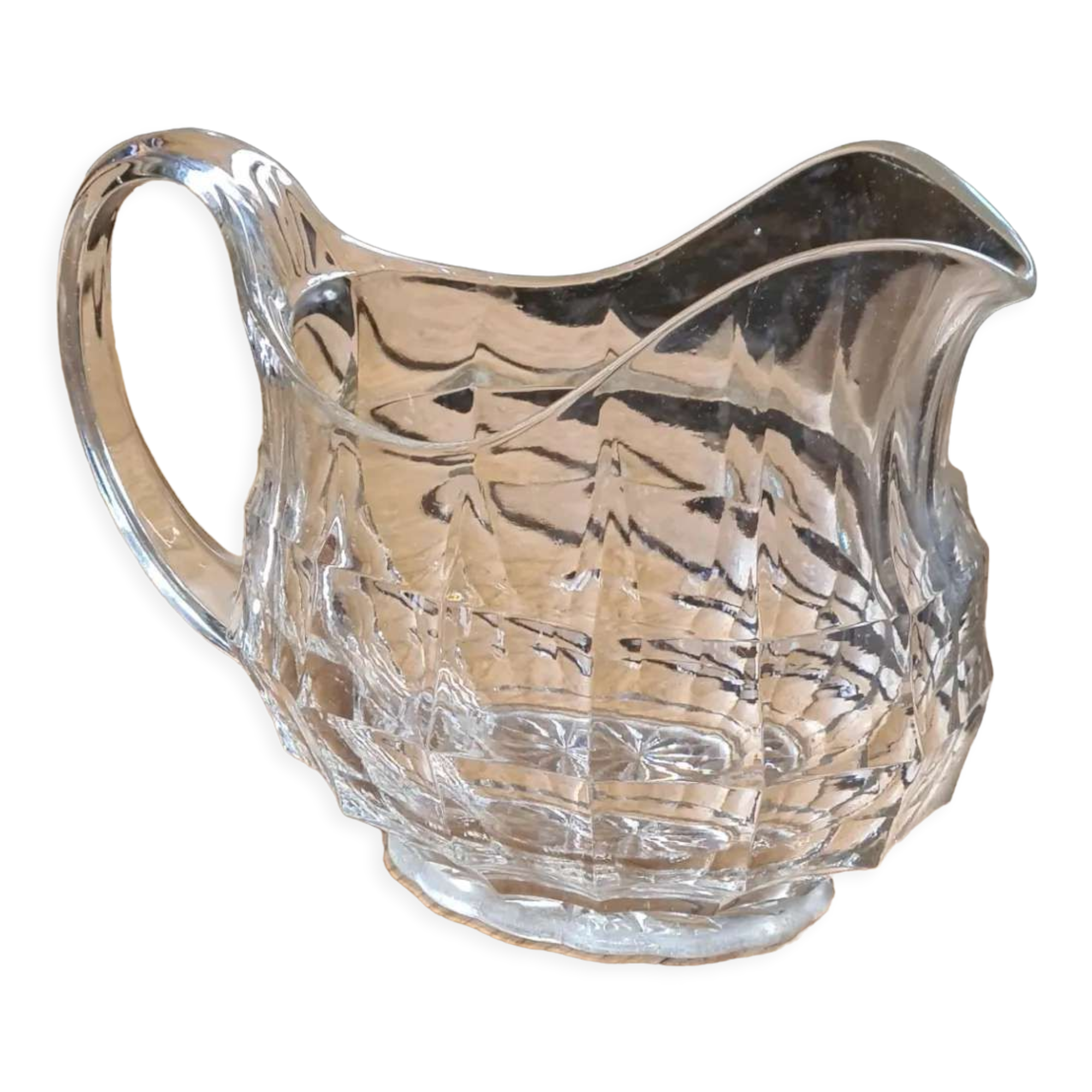 Faceted antique glass pitcher