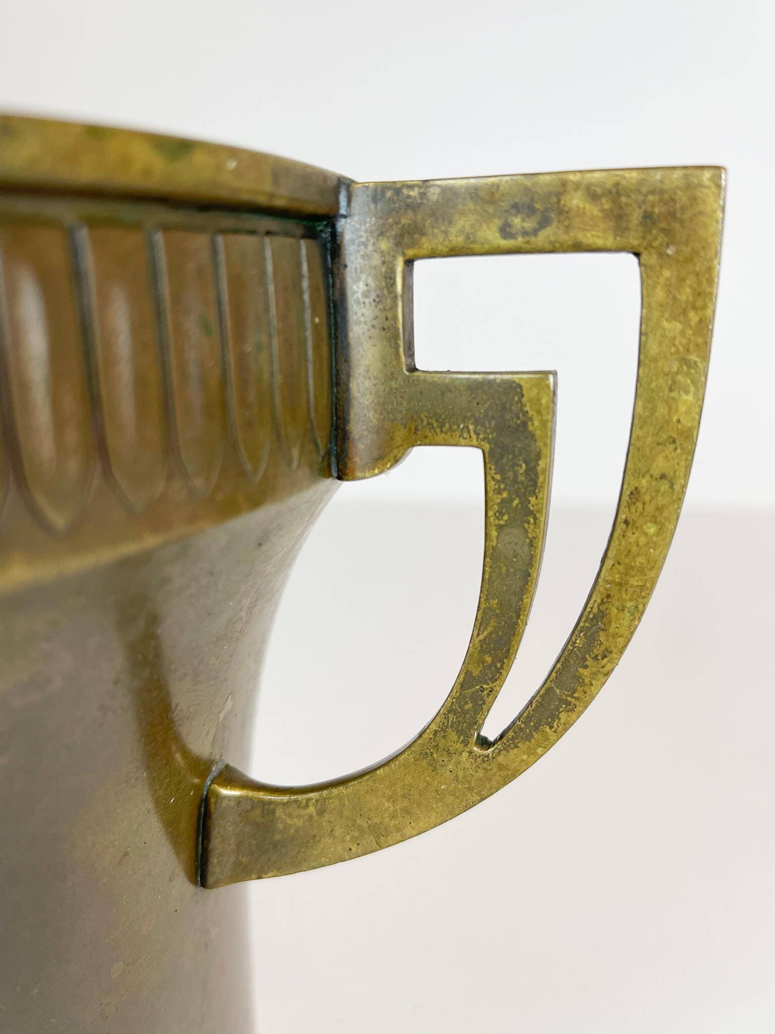 Art Deco champagne cooler in copper and brass with relief patterns, Sweden, 1930s.