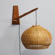 Adjustable mid-century wooden wall lamp with rattan shade, 1970s