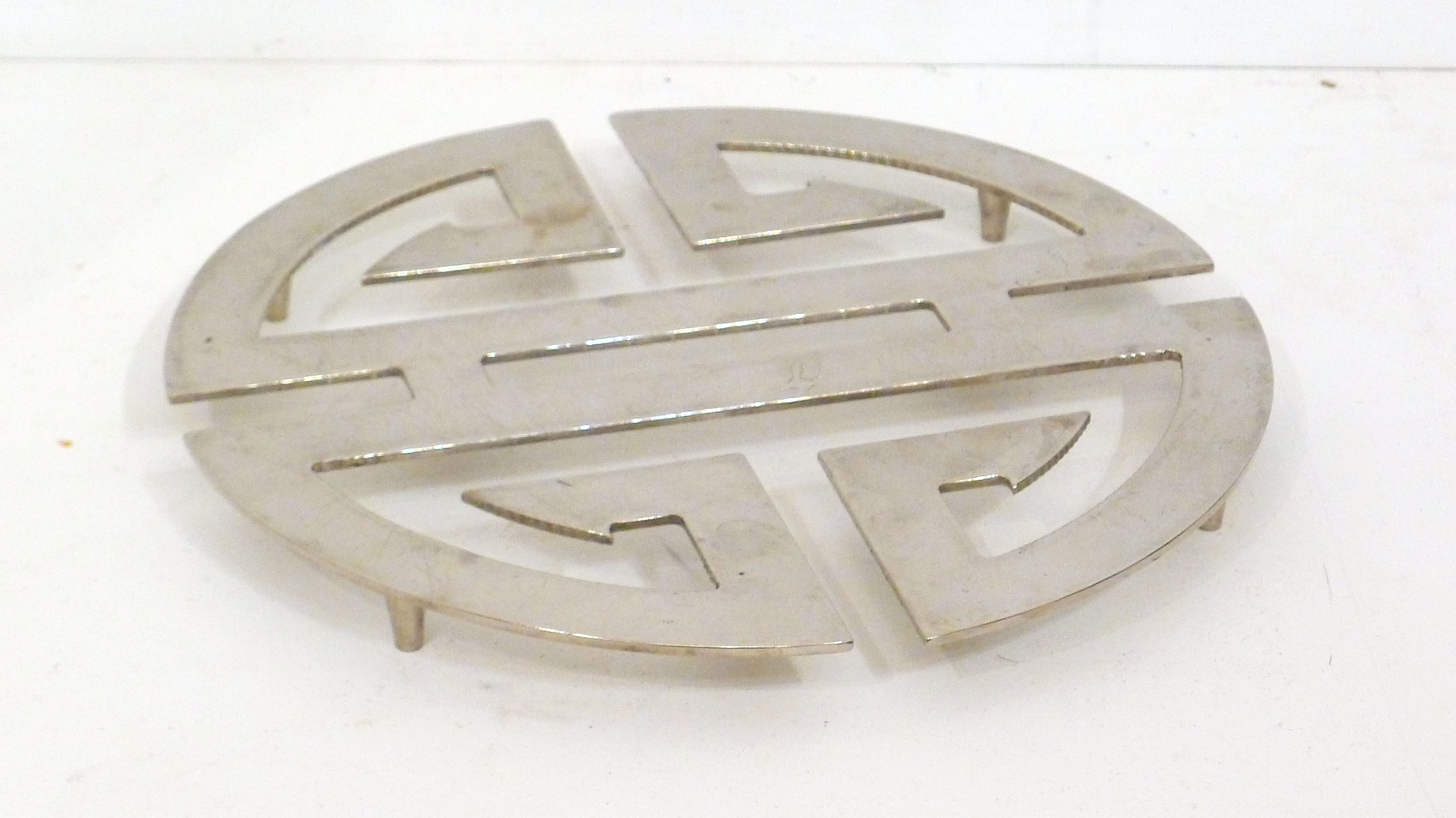 Under the geometric plate opened