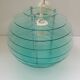 Suspension baladeuse design globe vert vintage