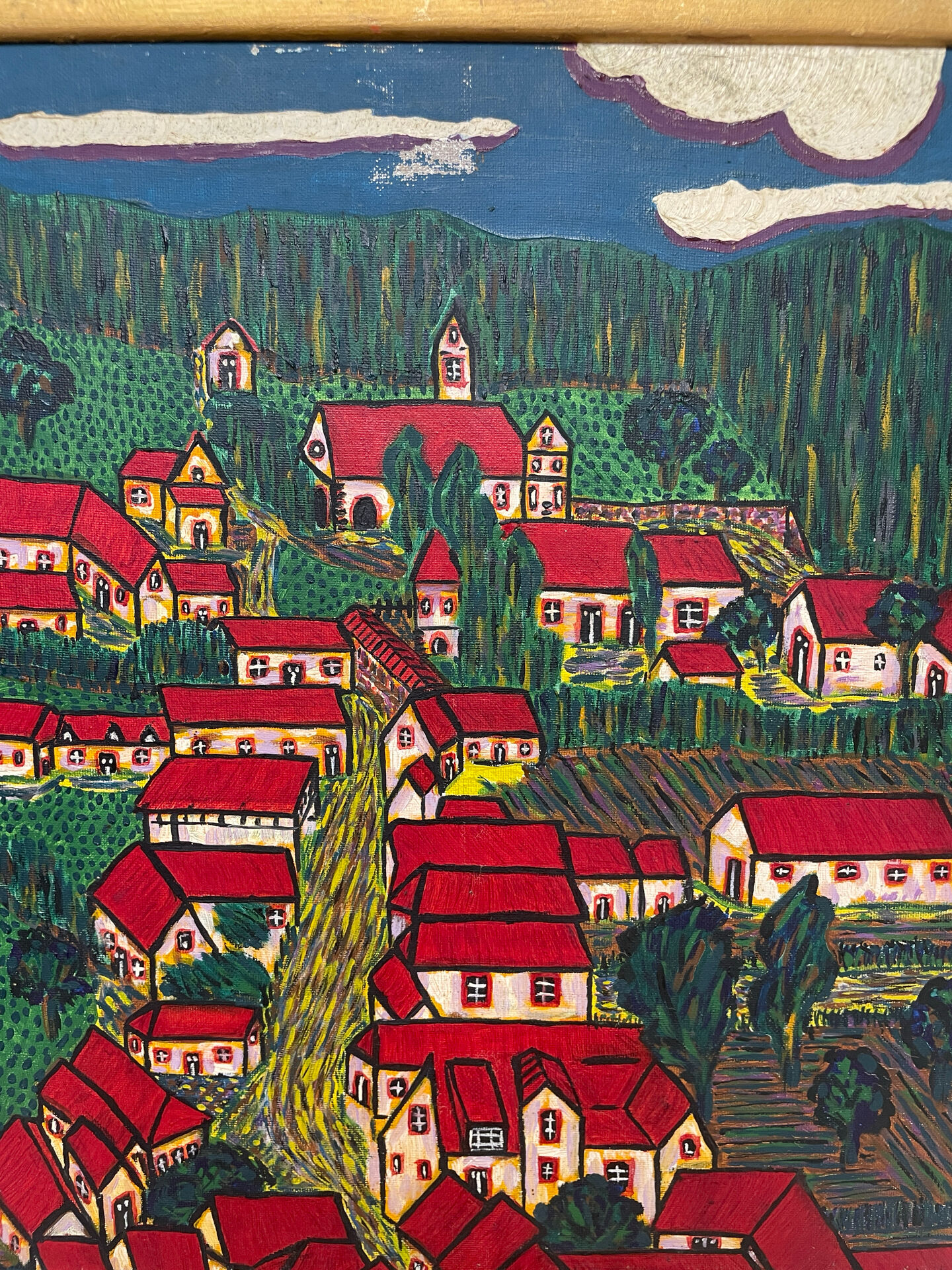 Painting the village with red roofs.