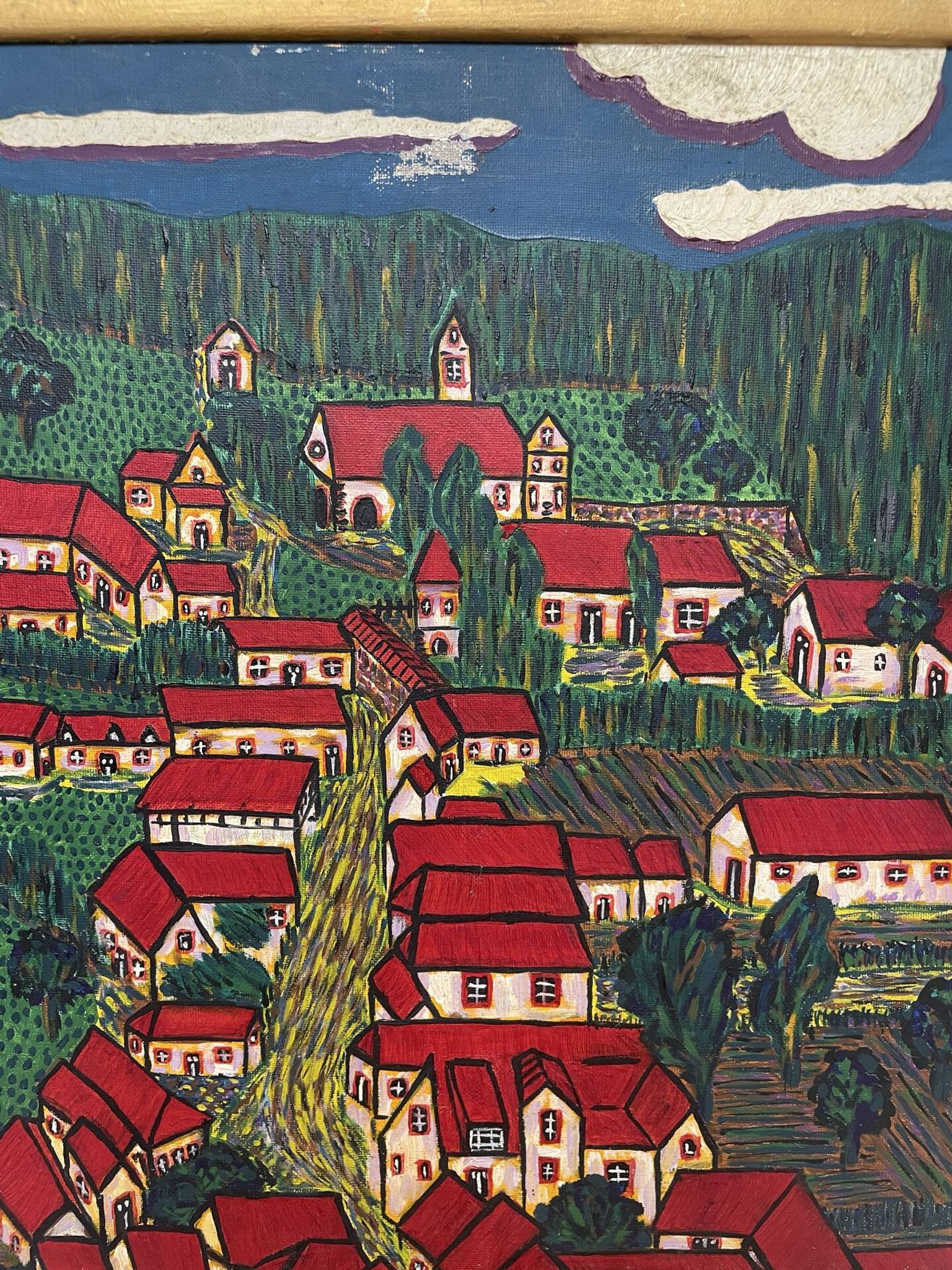 Peinture le village aux toits rouge
